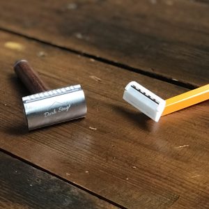 A Dark Stag SR1 Safety Razor alongside a disposable