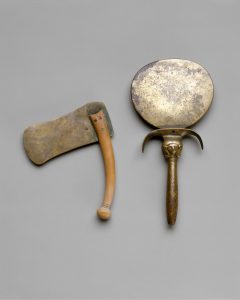 An Ancient Egyptian hatchet razor and mirror