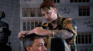 Max demonstrating layering Andy's hair
